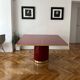 Table de salle à manger en stratifié brillant et marqueterie en laiton