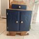 deep blue and wood refurbished bedside table