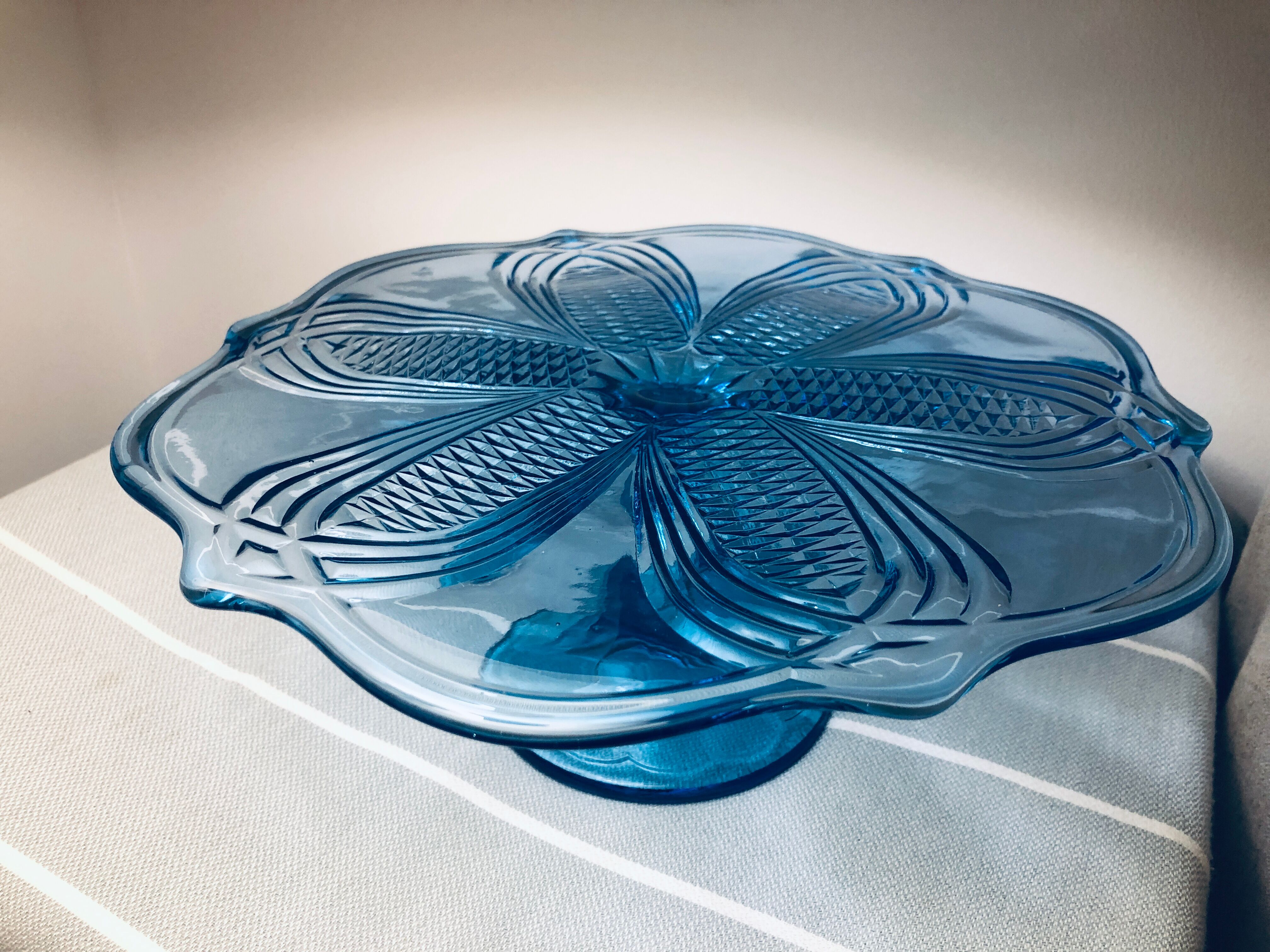 Blue vintage glass cake display