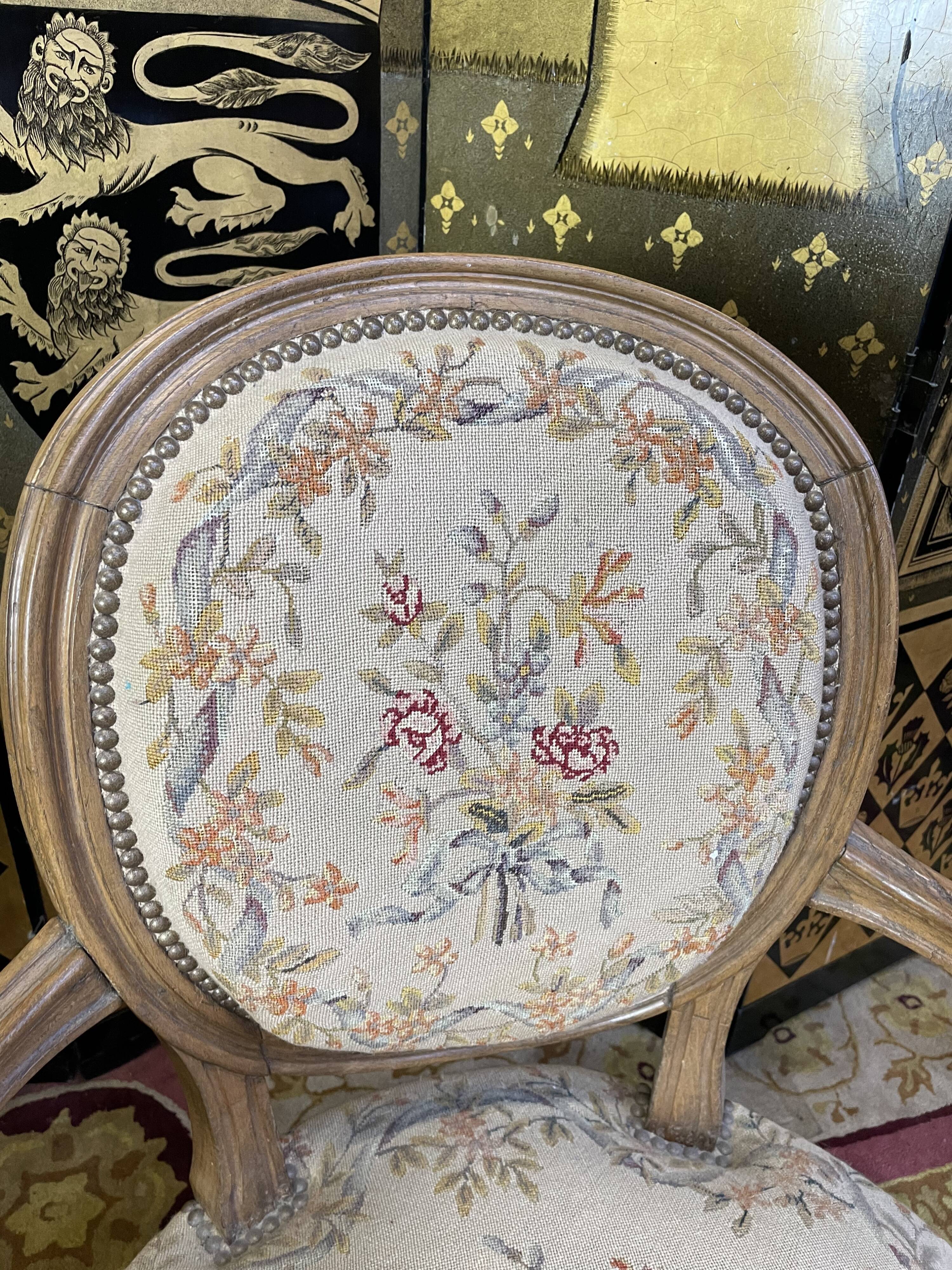 Pair of Louis XVI period medallion armchairs