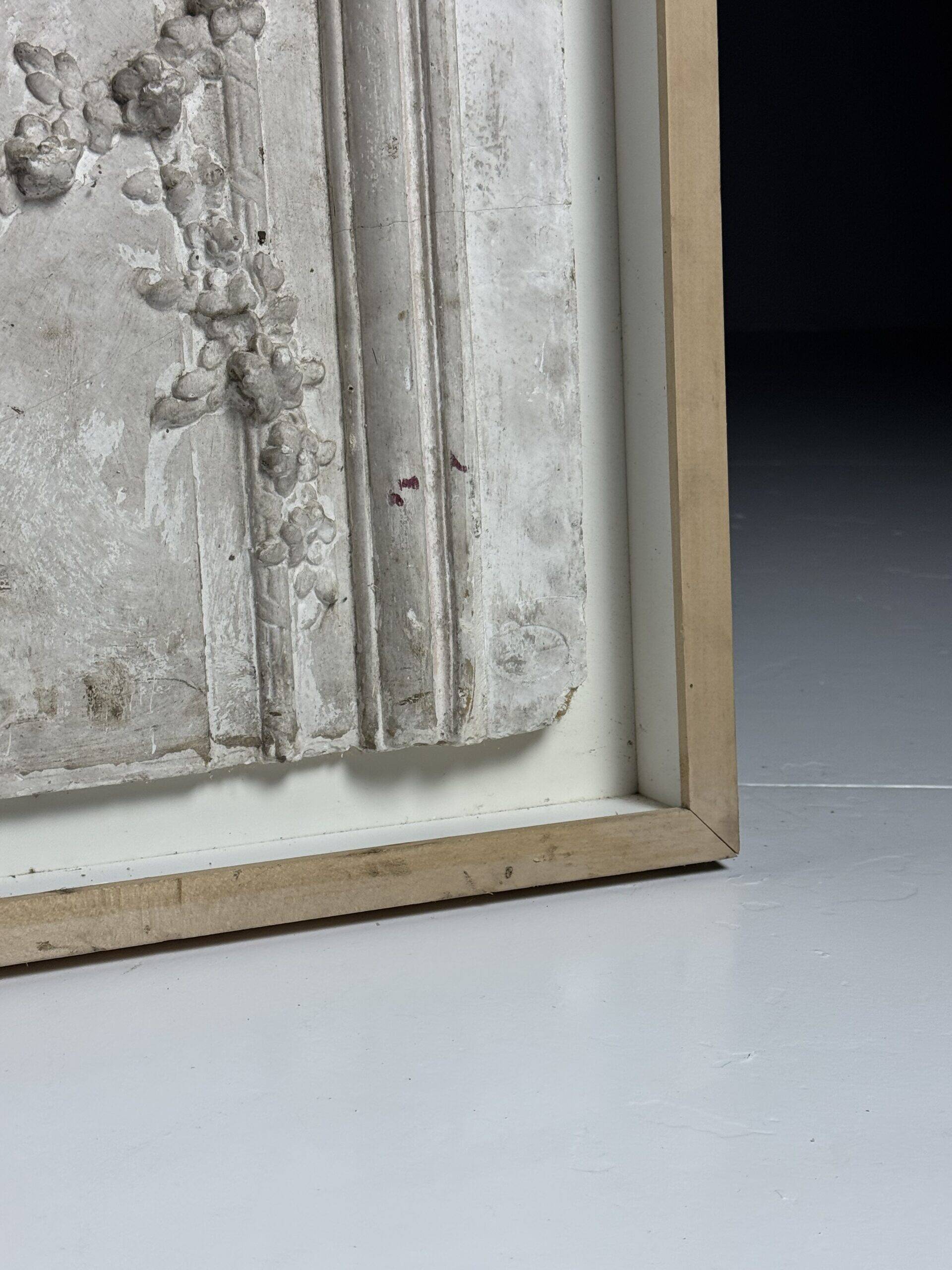 Plaster ceiling fragment framed