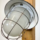 Industrial black enamel and cast iron wall lamp with iron grid, 1960s