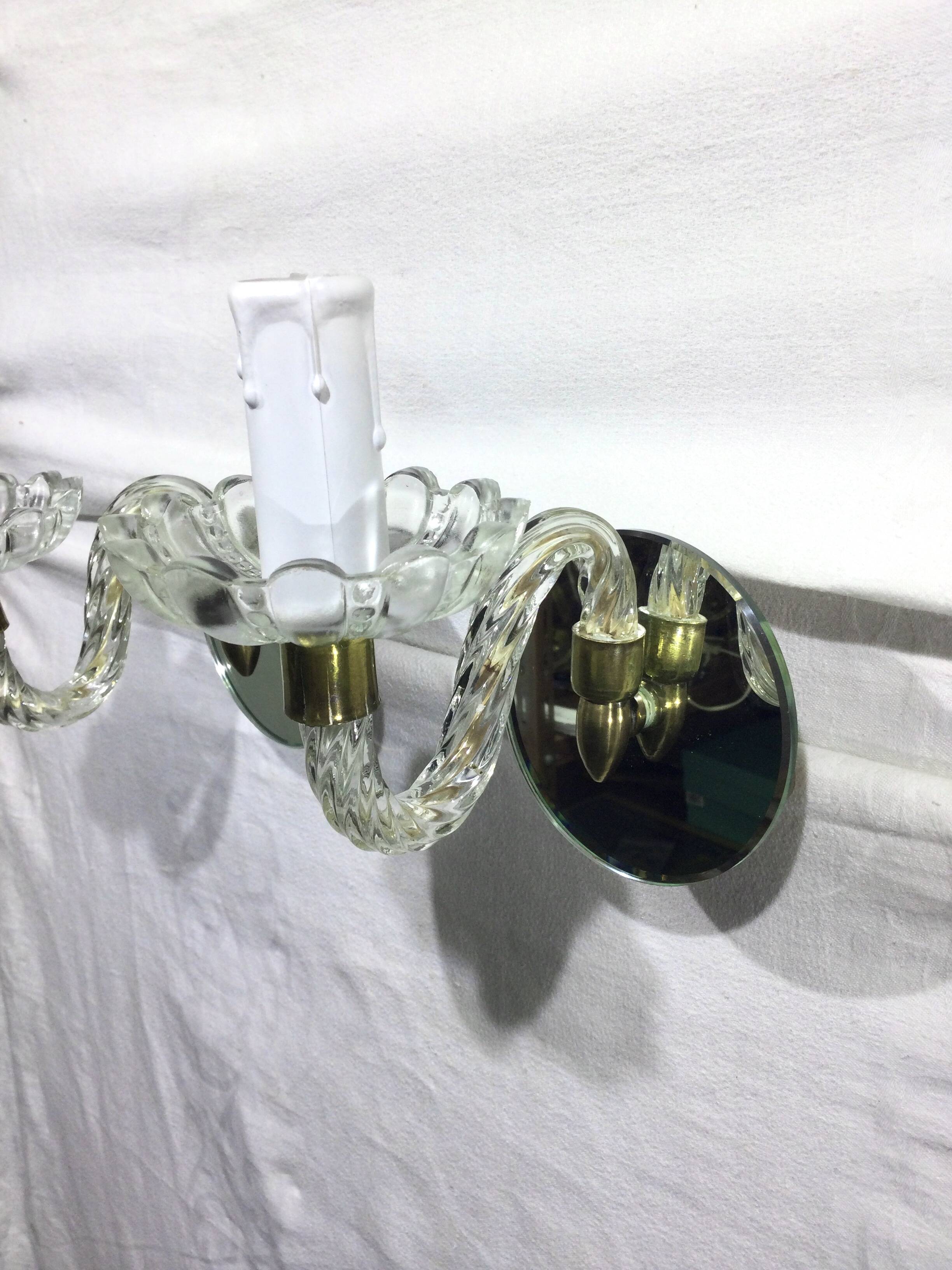 Pair of glass and mirror sconces