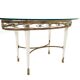 Brass Coffee Table with an Oval Glass Top in the Style of Pierluigi Colli