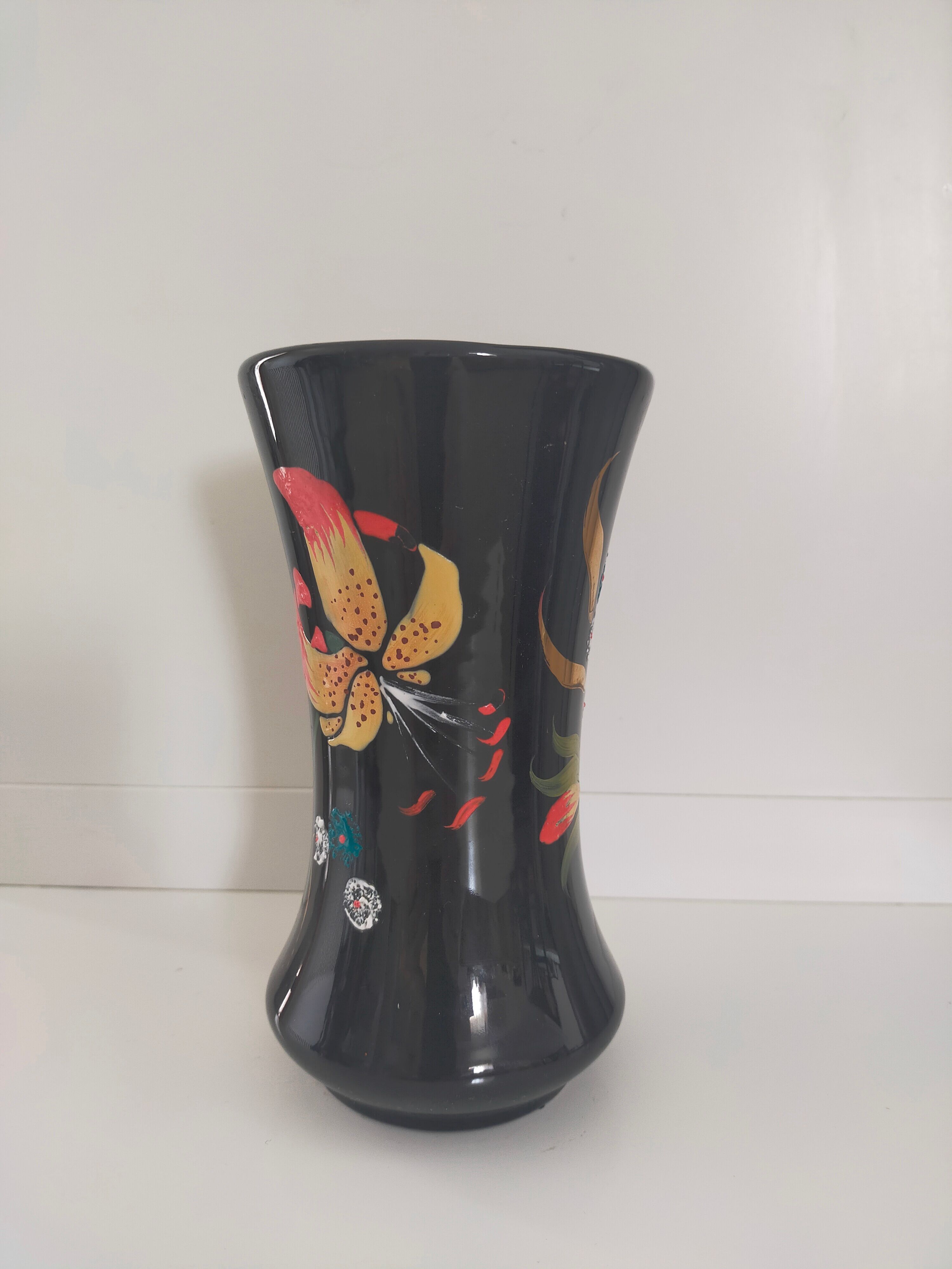 Longwy, Louis Valenti Black vase decorated with tiger lilies in polychrome enamels