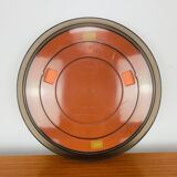 Round mirror with amber rim from the 70s, vintage