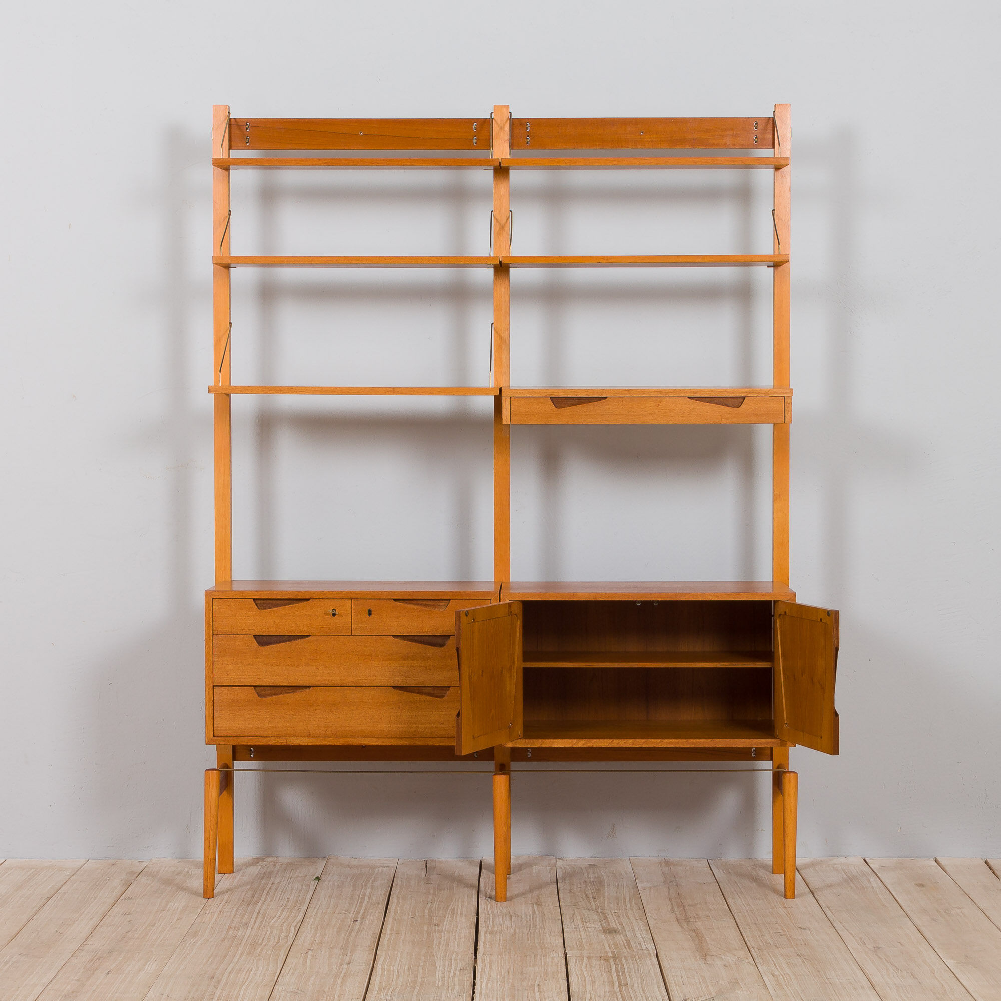 Rival 2 bay teak wall unit with 3 cabinets and 5 shelves by Brodrene Jatogs Norway, Kjell Riise, 196