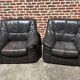 Pair of patinated leather club armchairs