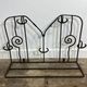 Wall-mounted coat rack in wrought iron, early 20th century