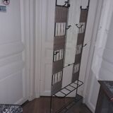 Metal and wicker coat holder