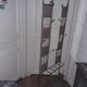 Metal and wicker coat holder