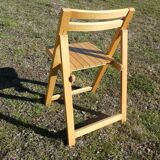 Pair of vintage folding chairs in light wood