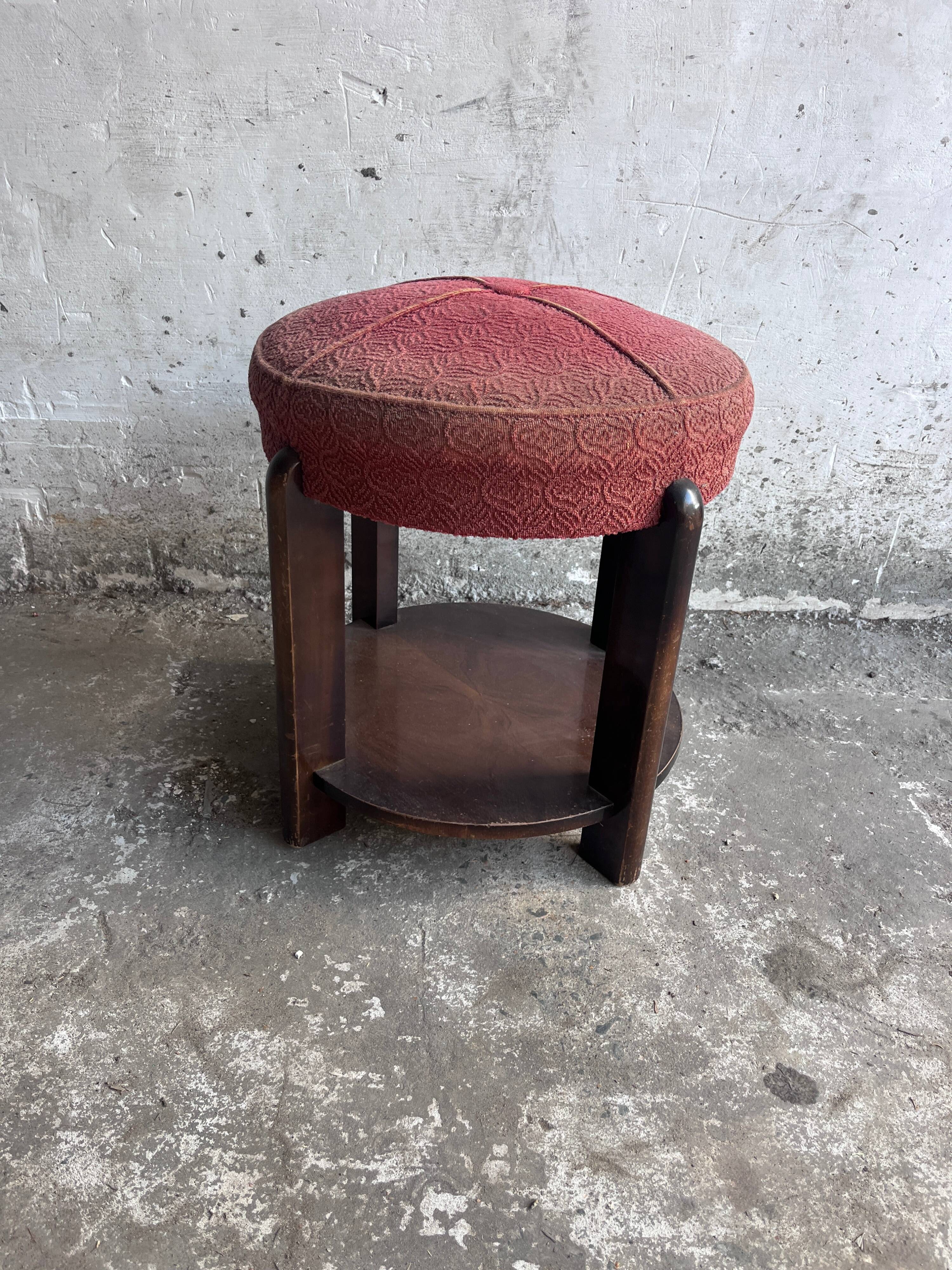 Art Deco stool upholstered with a lower shelf, France, circa 1930.