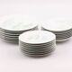 Set of 7 porcelain plates Lourioux Deshoulières - dessert, plates and deep bowls.