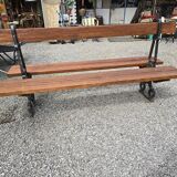 Antique double garden bench from the city of Paris in cast iron and wood