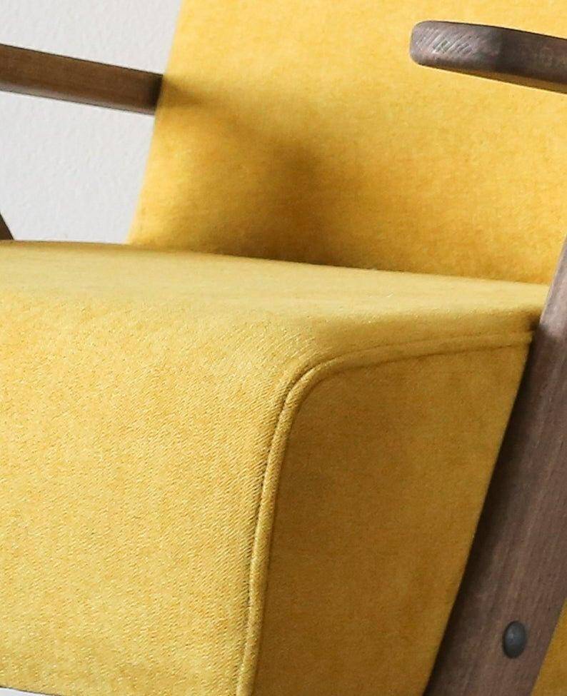 Fauteuil vintage en tissu jaune