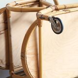 Vintage bamboo and rattan serving trolley on wheels