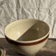 Large speckled beige salad bowl with ochre trim H14 D25