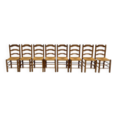 Série de 8 chaises en orme massif et assise paillée