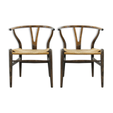 Pair of CH24 wishbone dining chairs by Hans Wegner for Carl Hansen Denmark
