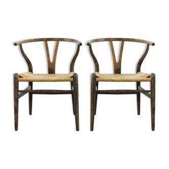 Pair of CH24 wishbone dining chairs by Hans Wegner for Carl Hansen Denmark