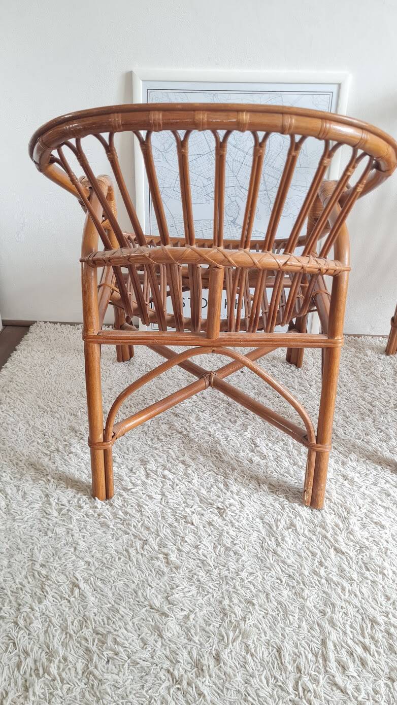 Pair of vintage rattan armchairs circa the 1970s.