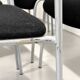 Grey steel chair and black fabric