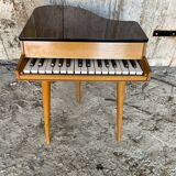 Piano a child's old wood + formica compass legs 1960s vintage