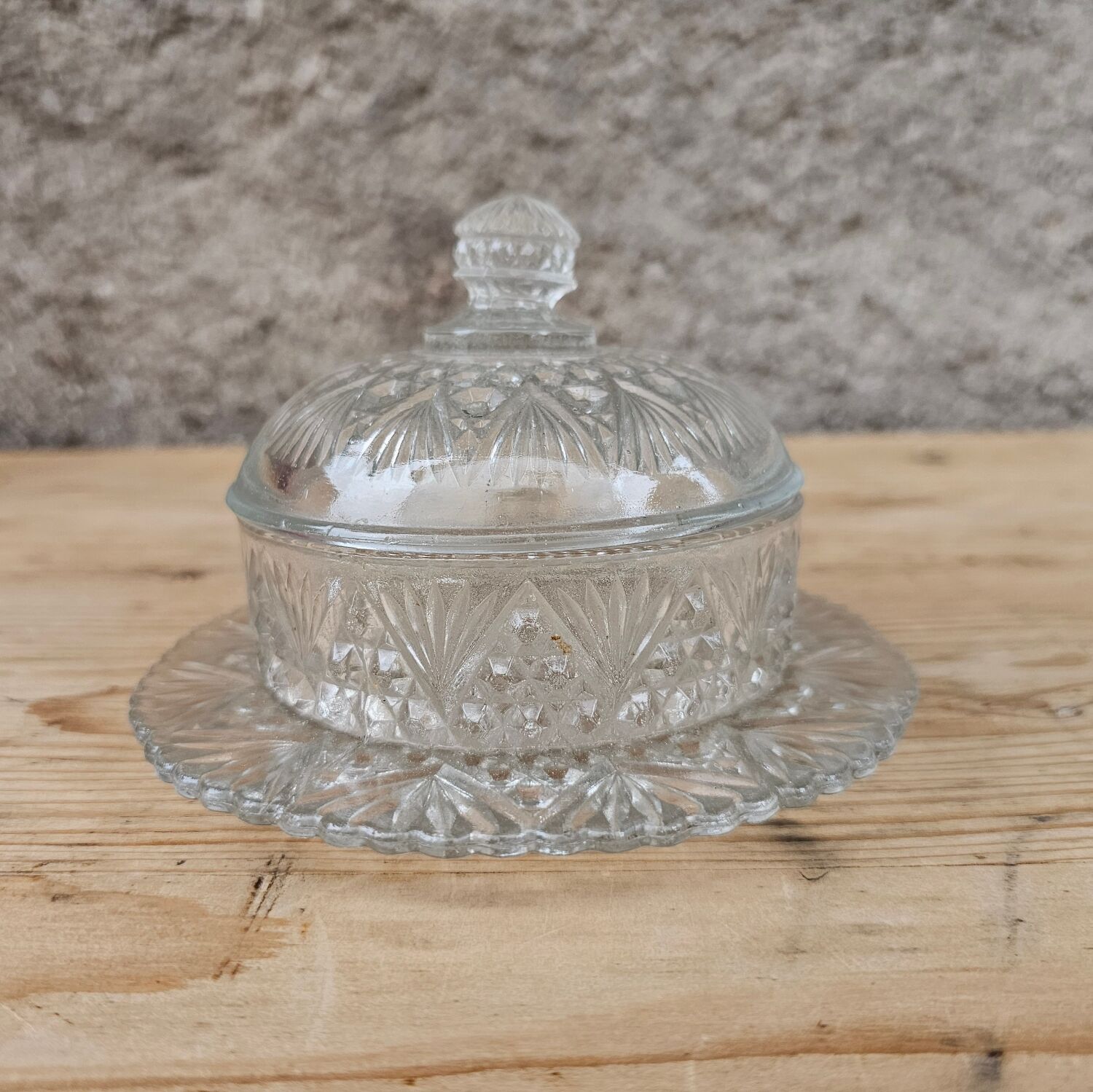 Round molded glass butter dish