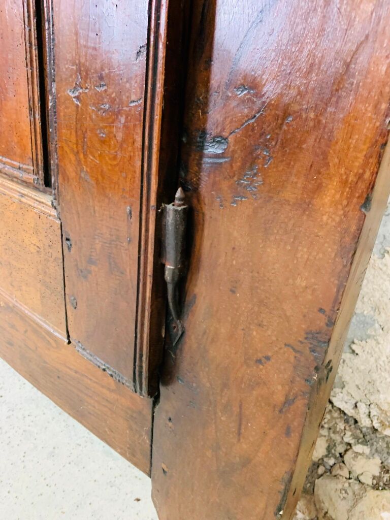 Old wooden doors of a Savoyard wardrobe chalet mountain vintage