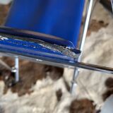 Quartet of blue chairs with design curves