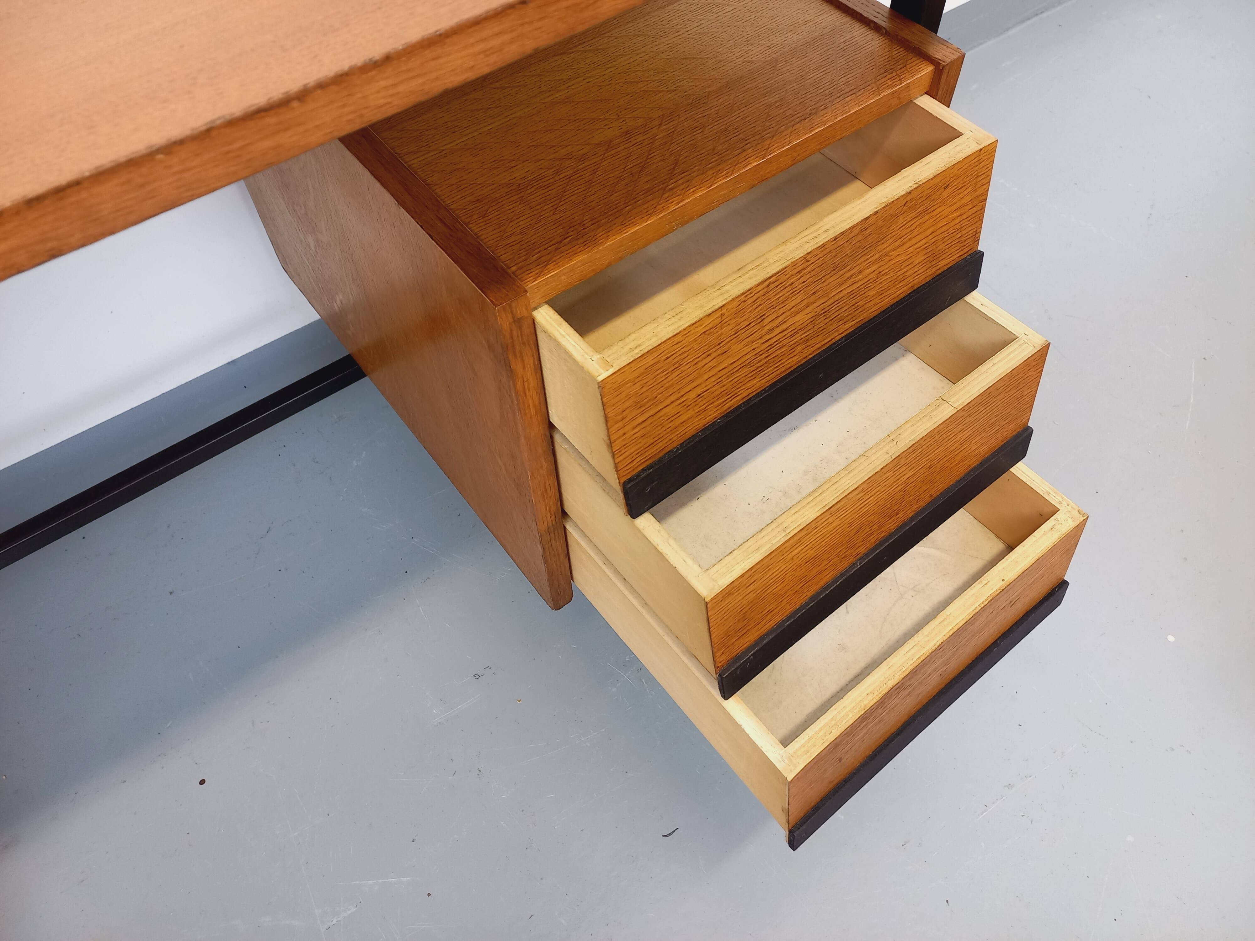 Vintage modernist desk in wood and black metal from the 60s
