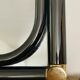Vintage rectangular wall mirror in tubular metal and brass, 1970s/1980s.