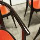Table and 6 armchairs Baumann Diese, design Pagnon Pelhaître, Wenge color and red,