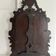 Napoleon III mirror in carved blackened wood, 19th century