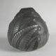 Art Nouveau pewter vase, signed PETIZON, early 20th century.