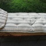 Old wrought iron folding bed