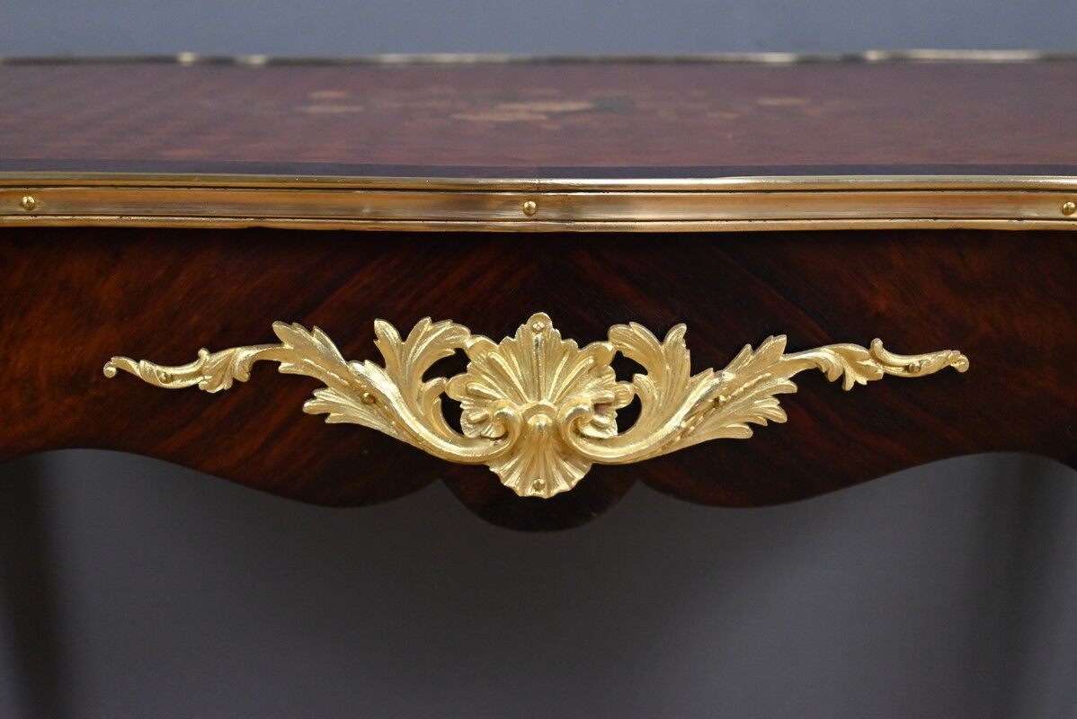 Rosewood, mahogany, and rosewood desk-table, Louis XV style – early 20th century.