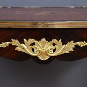 Rosewood, mahogany, and rosewood desk-table, Louis XV style – early 20th century.