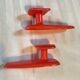 2 orange plastic hooks 70s.
