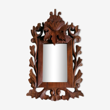 Carved wooden mirror 34 x 20 cm