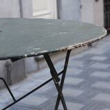 Folding wrought iron garden table
