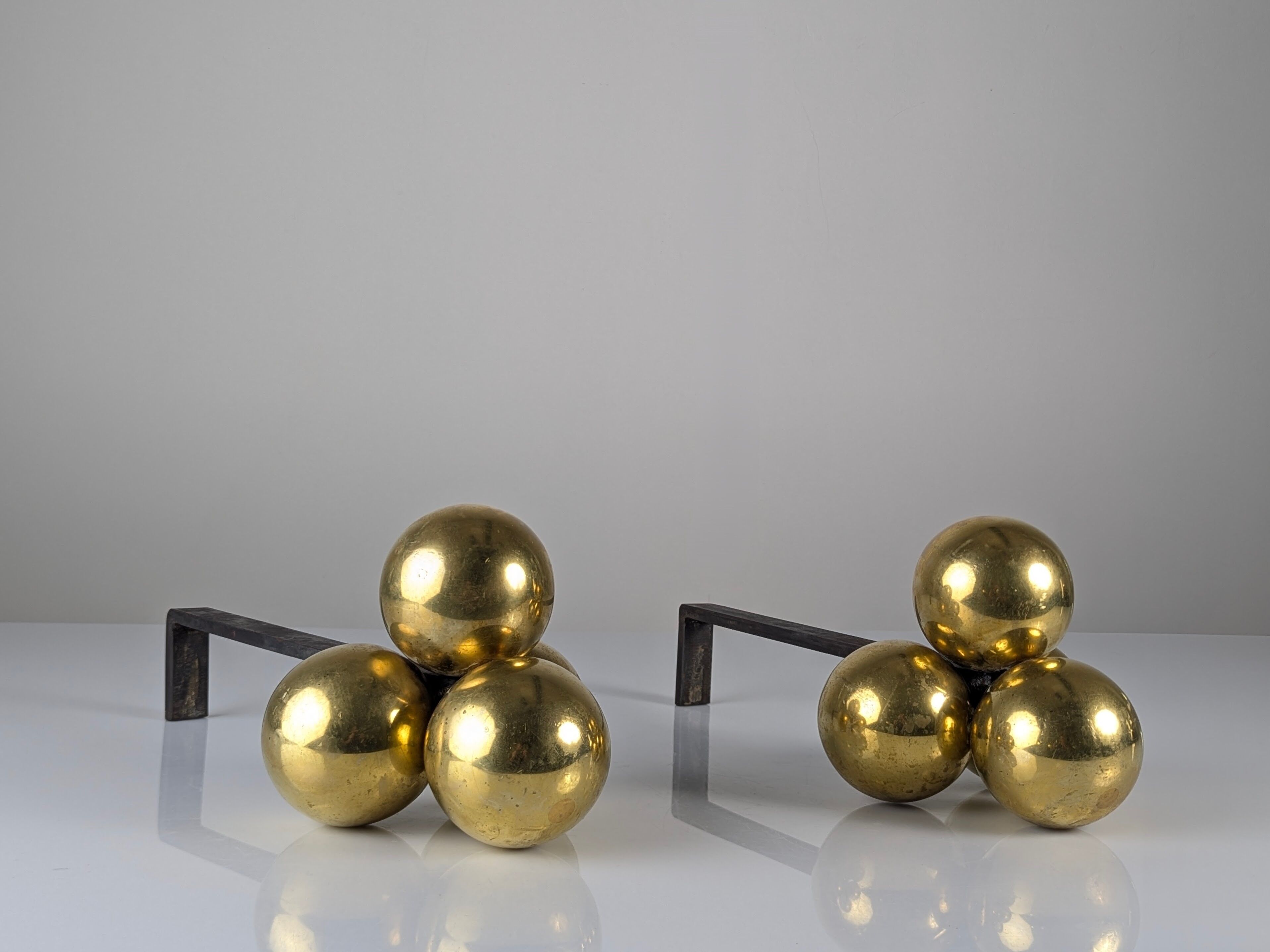 Bronze and wrought iron andirons by Jacques Adnet, 1930s