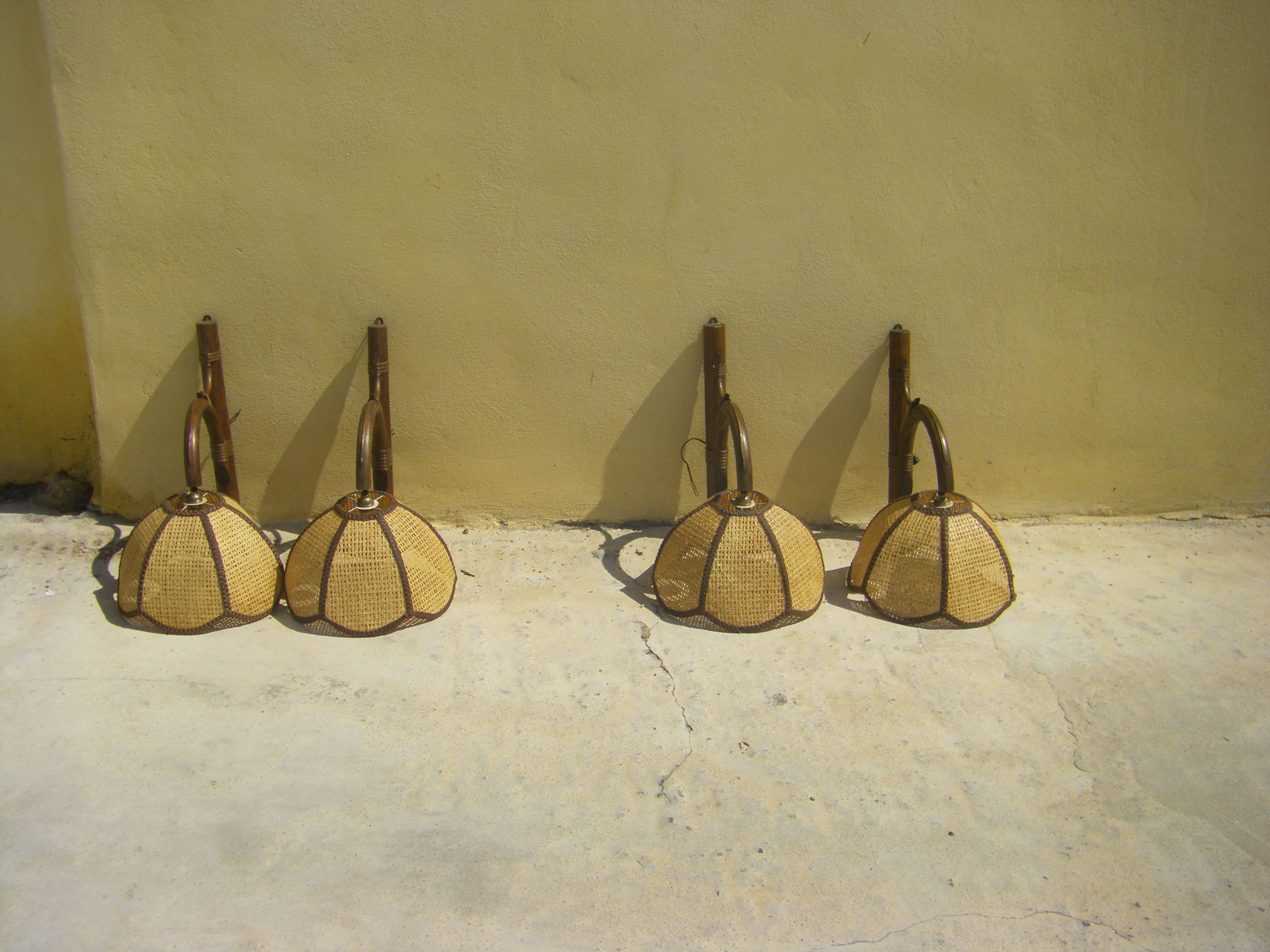 Four vintage rattan wall lamps