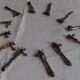 Lot of 12 sleeves with leg, silver metal