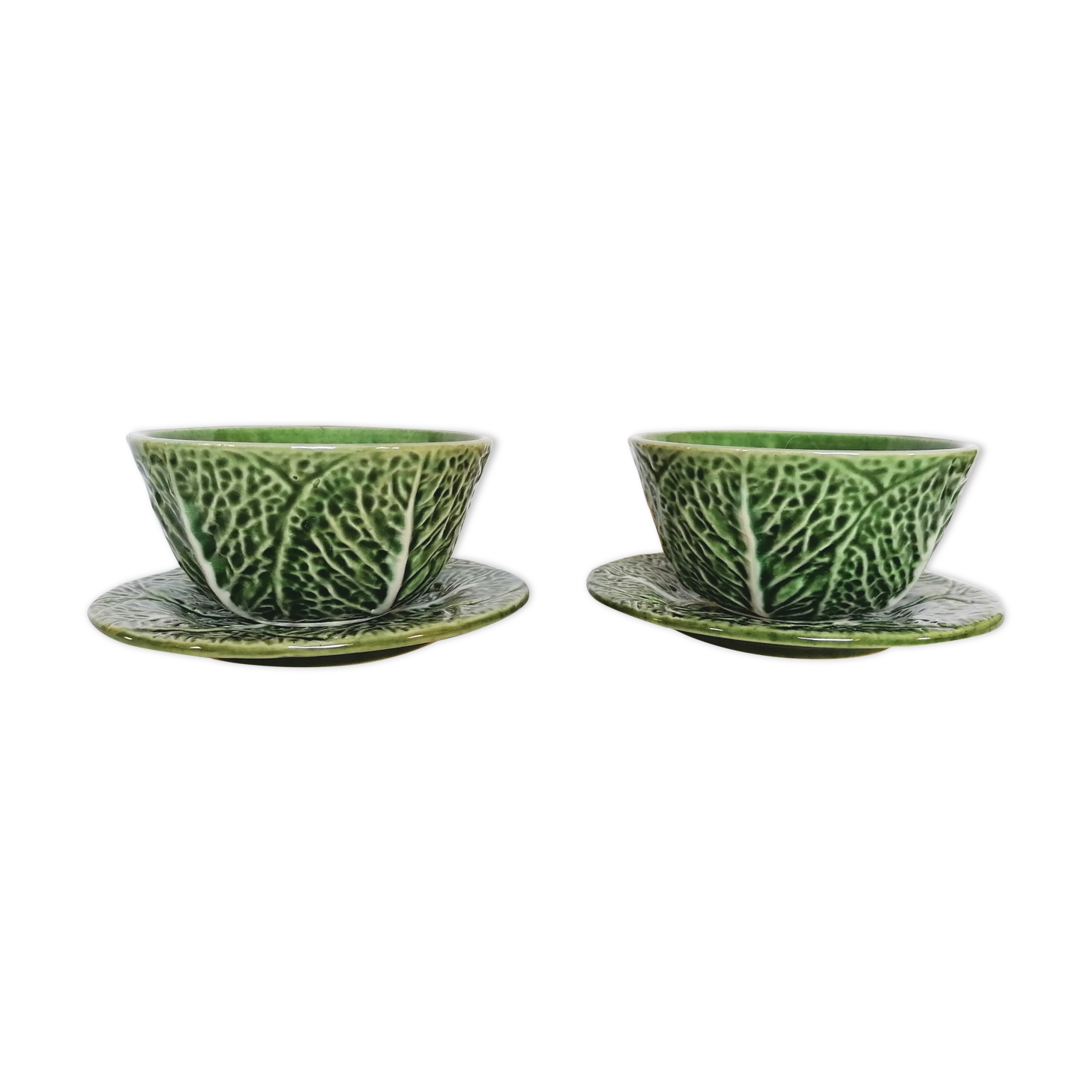 Lot bowls and plates in dabbling cabbage leaves