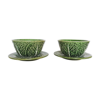 Lot bowls and plates in dabbling cabbage leaves