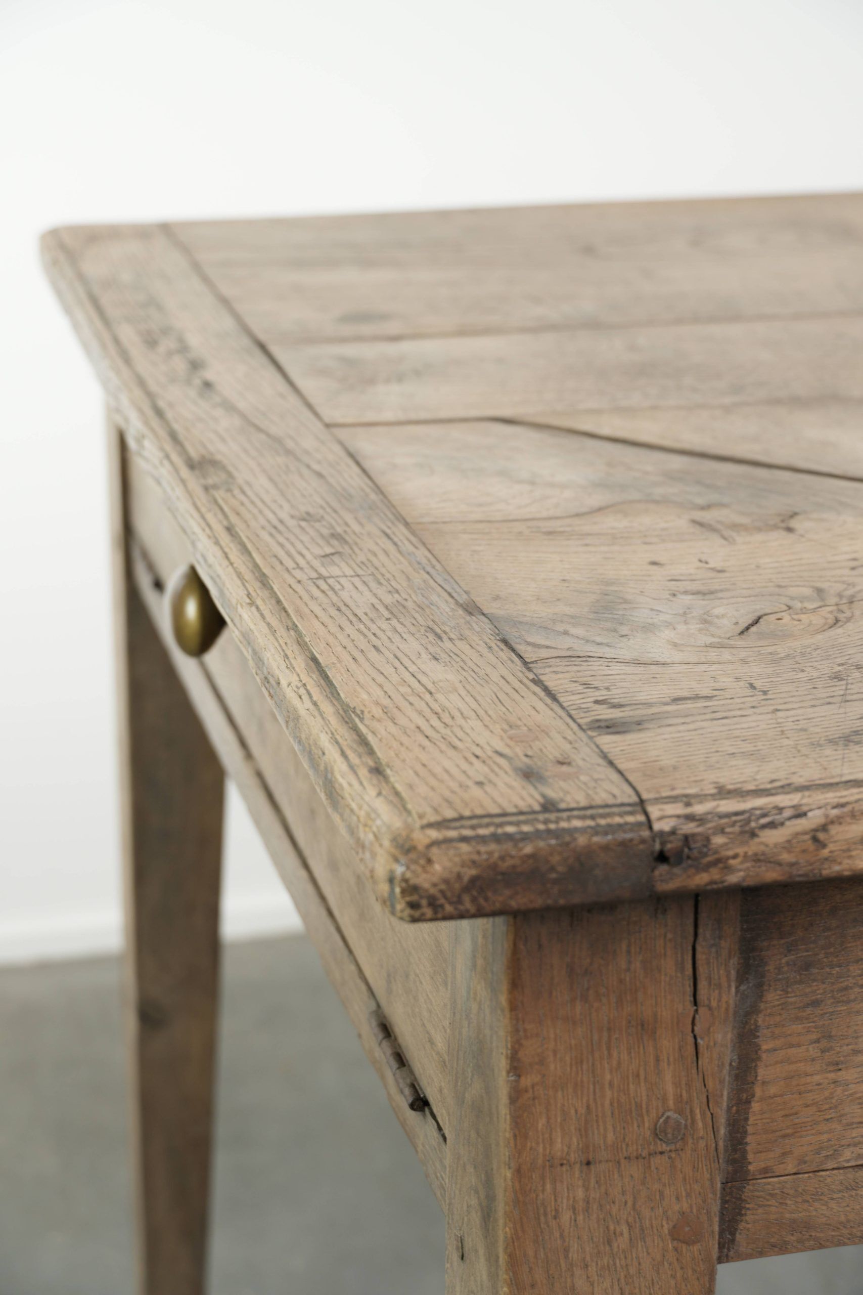 Antique French oak dining table for 6 to 8 people with a baguette drawer