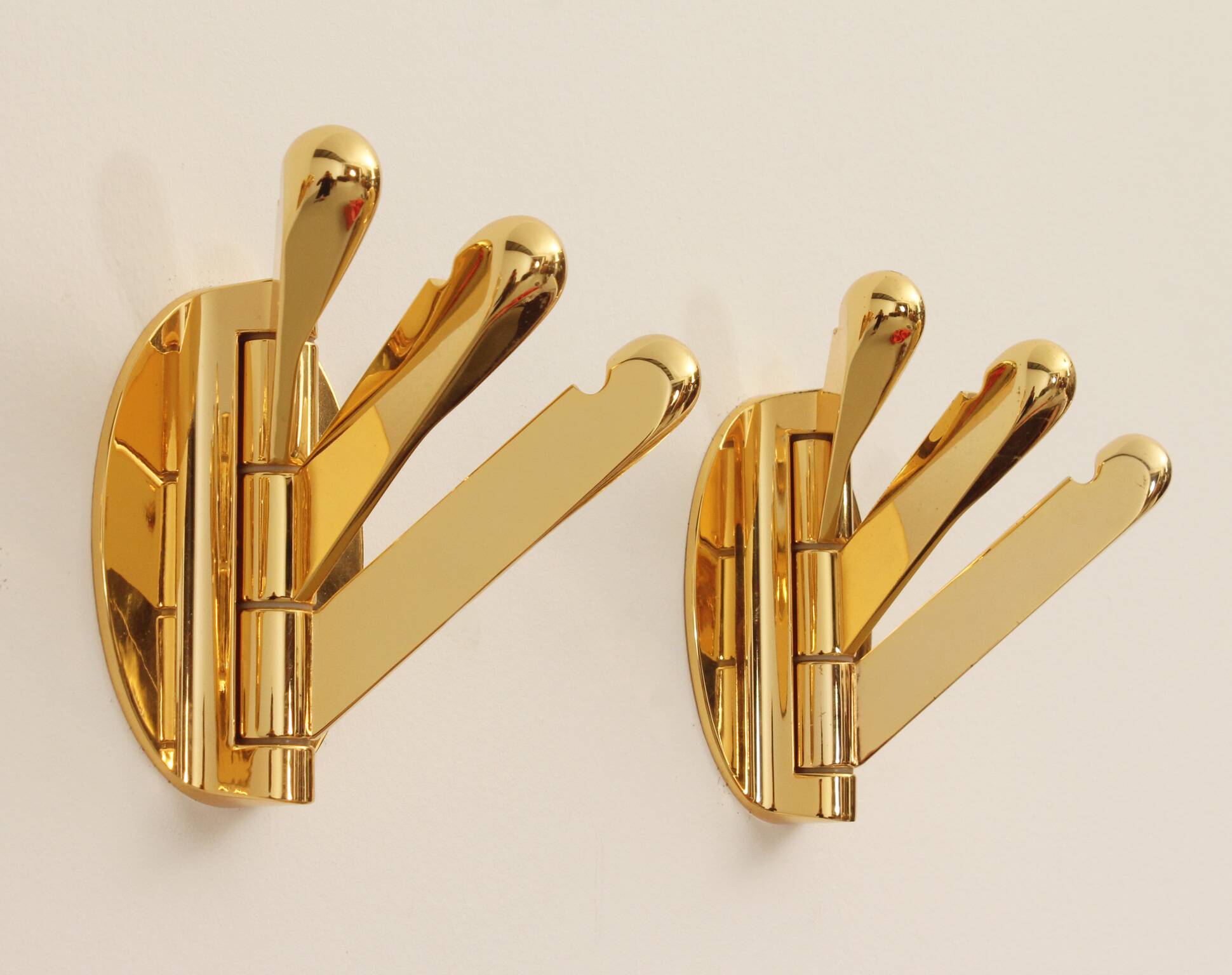 Triple foldable wall coat rack in brass, Spain, 1970s.