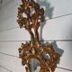 Italian mirror in gilded wood with gold leaf from the 18th century.